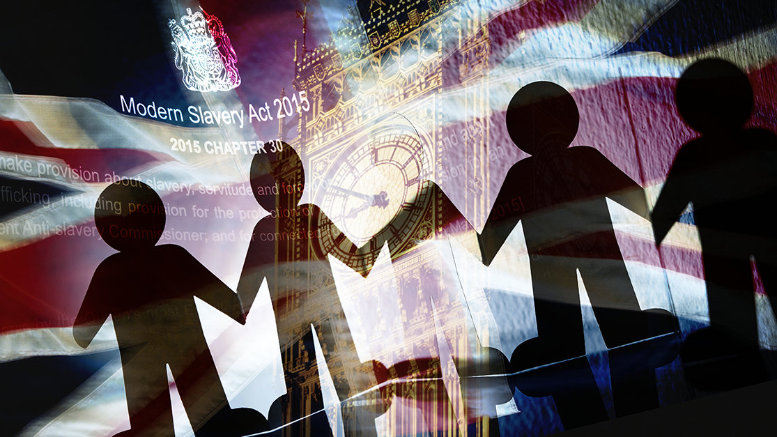 UK flag with paper men and the anti-slavery law
